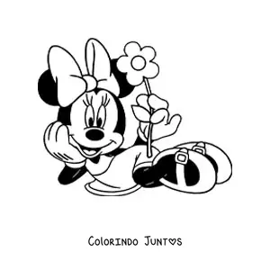 Desenho para colorir da Minnie deitada segurando uma flor